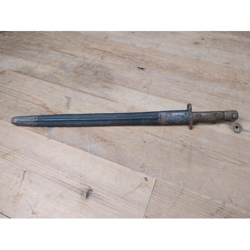 127a - WW I. bayonet and scabbard. { 38cm L }.