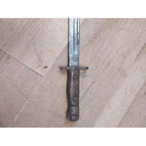 127a - WW I. bayonet and scabbard. { 38cm L }.