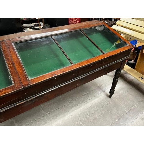 416A - 19th. C. glazed mahogany display cabinet with four lift up doors. { 105cm H X 243cm L X 119cm D }.