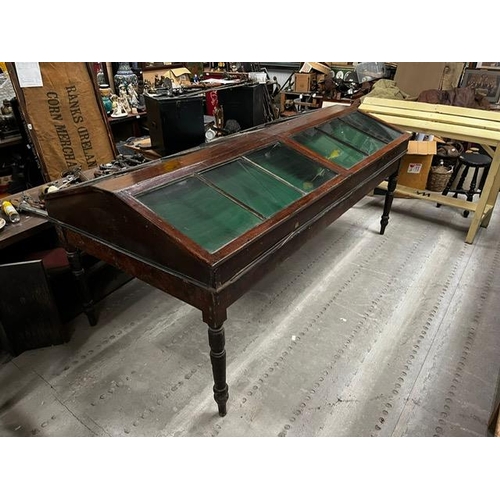 416A - 19th. C. glazed mahogany display cabinet with four lift up doors. { 105cm H X 243cm L X 119cm D }.