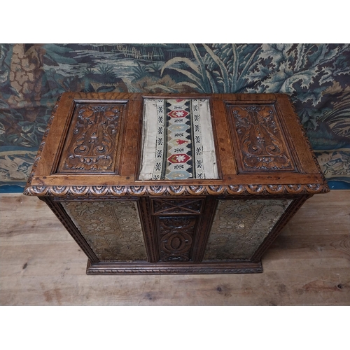 2 - 19th C. carved oak blanket box with tapestry panels {75 cm H x 85 cm W x 44 cm D}.