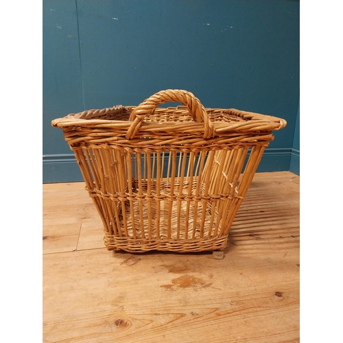 21 - Early 20th C. wicker basket with handles. {46 cm H x  69 cm W x  50 cm D}.