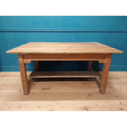 36 - Early 20th C. pine kitchen table on square legs and single stretcher. {74 cm H x 153 cm W x 101 cm D... 