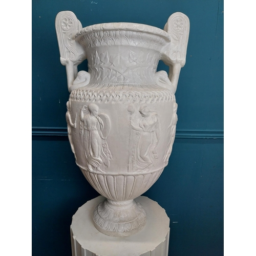 61 - 20th C. Grand Tour plaster Grecian Urn on Pedestal. {147 cm H x 56 cm W x 56 cm D}.