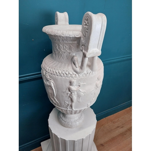 61 - 20th C. Grand Tour plaster Grecian Urn on Pedestal. {147 cm H x 56 cm W x 56 cm D}.