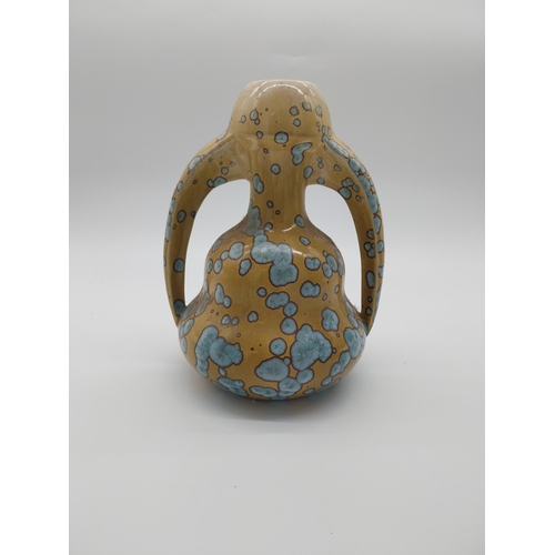 63 - Early 20th C. French ceramic vase with two handles. {26 cm H x 20 cm W x 16 cm D}.