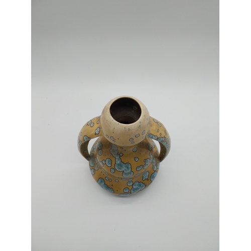 63 - Early 20th C. French ceramic vase with two handles. {26 cm H x 20 cm W x 16 cm D}.