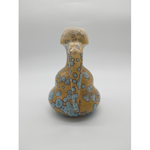 63 - Early 20th C. French ceramic vase with two handles. {26 cm H x 20 cm W x 16 cm D}.