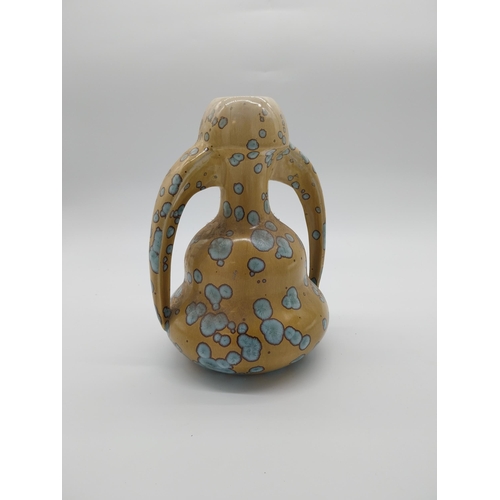 63 - Early 20th C. French ceramic vase with two handles. {26 cm H x 20 cm W x 16 cm D}.