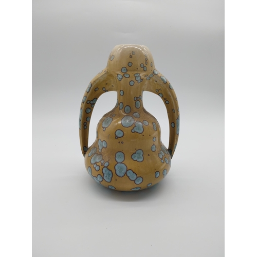 63 - Early 20th C. French ceramic vase with two handles. {26 cm H x 20 cm W x 16 cm D}.