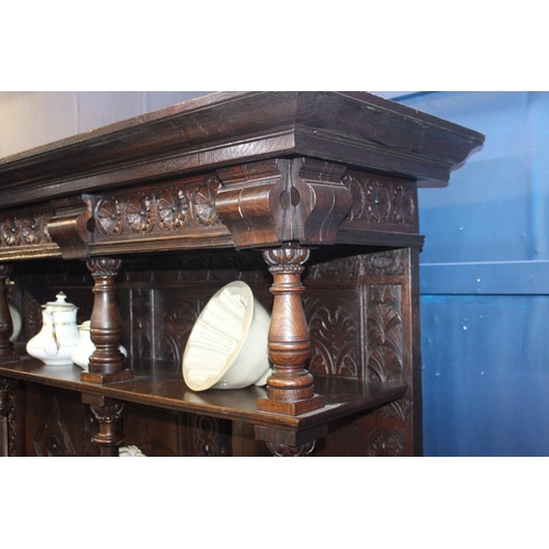 79 - 19th C. carved oak dresser with two inlaid doors {H 180cm x W 143cm x D 58cm }. { not on site for vi... 