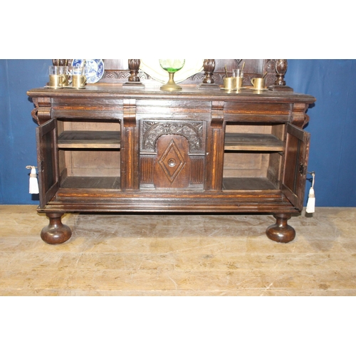 79 - 19th C. carved oak dresser with two inlaid doors {H 180cm x W 143cm x D 58cm }. { not on site for vi... 