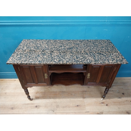 872 - Edwardian mahogany wash stand with marble top raised on turned legs and castors {76 cm H x 123 cm W ... 