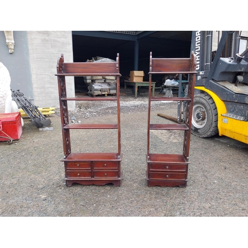 873 - Two mahogany wall hanging shelves in the Georgian style {}.