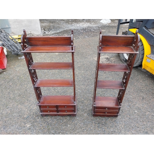 873 - Two mahogany wall hanging shelves in the Georgian style {}.