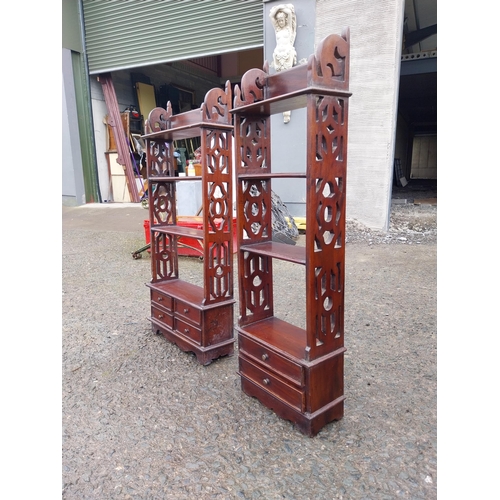 873 - Two mahogany wall hanging shelves in the Georgian style {}.