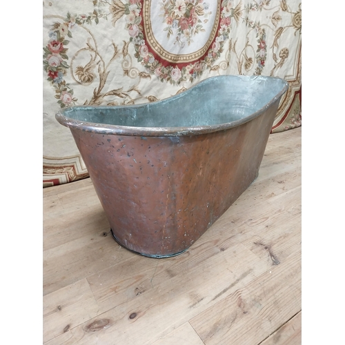 88 - 19th C. French copper bath. {62 cm H x 150 cm W x 60 cm D}.