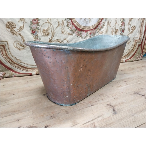 88 - 19th C. French copper bath. {62 cm H x 150 cm W x 60 cm D}.