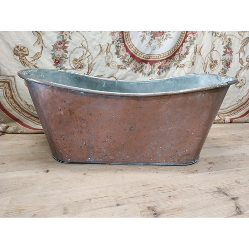 88 - 19th C. French copper bath. {62 cm H x 150 cm W x 60 cm D}.