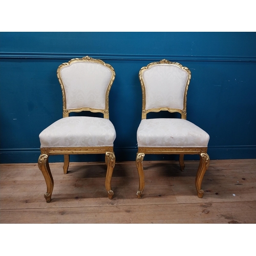 883 - Pair of decorative giltwood chairs in the Victorian style {100 cm H x 50 cm W x 48 cm D}.