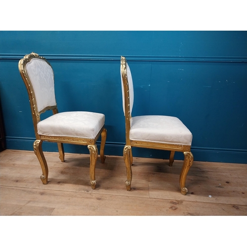 883 - Pair of decorative giltwood chairs in the Victorian style {100 cm H x 50 cm W x 48 cm D}.