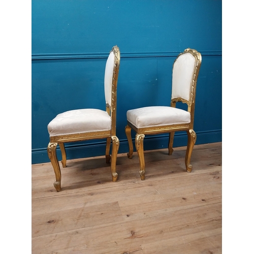 883 - Pair of decorative giltwood chairs in the Victorian style {100 cm H x 50 cm W x 48 cm D}.