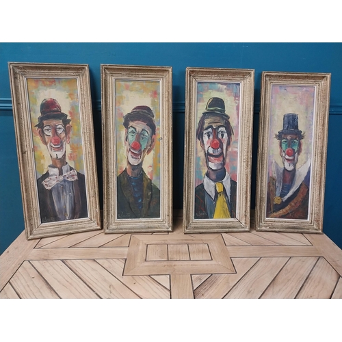 889 - Set of four early 20th C. Clown oil on canvases mounted in wooden frames {70 cm H x 29 cm W}.