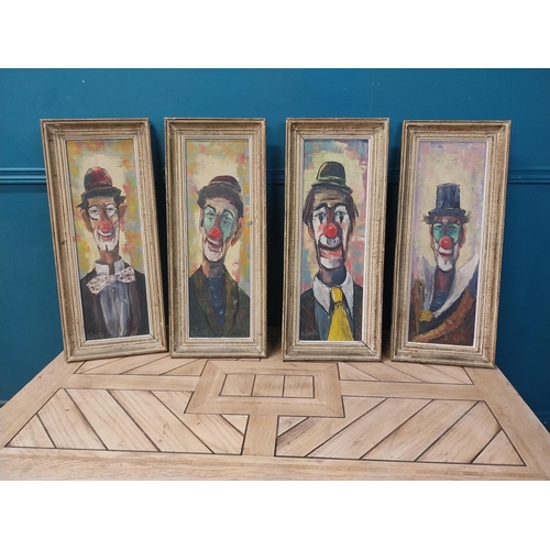 889 - Set of four early 20th C. Clown oil on canvases mounted in wooden frames {70 cm H x 29 cm W}.