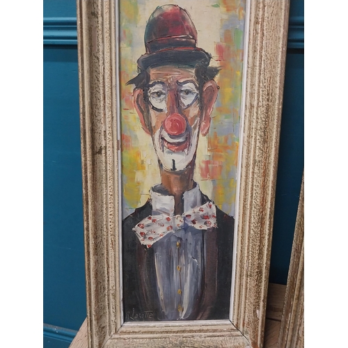 889 - Set of four early 20th C. Clown oil on canvases mounted in wooden frames {70 cm H x 29 cm W}.