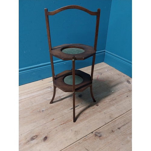 890 - Edwardian mahogany two tiered folding cake stand {60 cm H x 33 cm W x 33 cm D}.