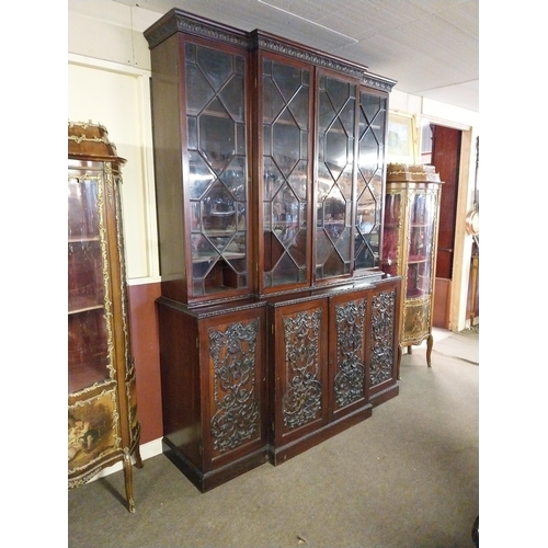 891 - Edwardian mahogany bookcase four astral glazed doors above four carved blind doors in the Adams styl... 