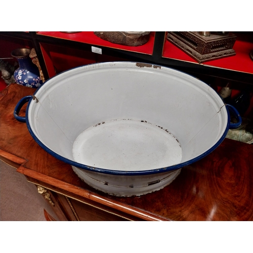 896 - Three early 20th C. enamel bowls {25 cm H x 43 cm W x 16 cm D, 14 cm H x 40 cm Dia. and 12 cm H x 27... 