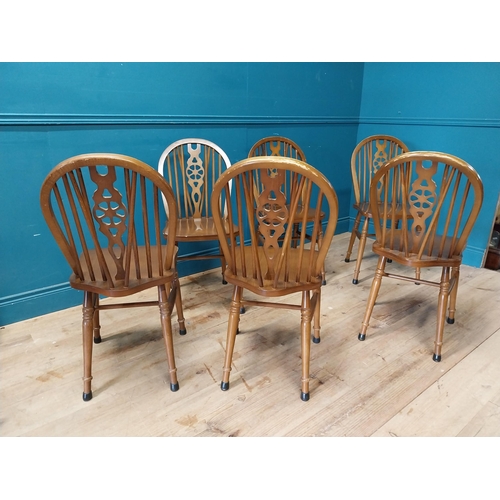 899 - Set of six wheel back kitchen chairs {90 cm H x 40 cm W x 46 cm D}.