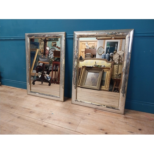 912 - Pair of decorative wall mirrors {107 cm H x 76 cm W].