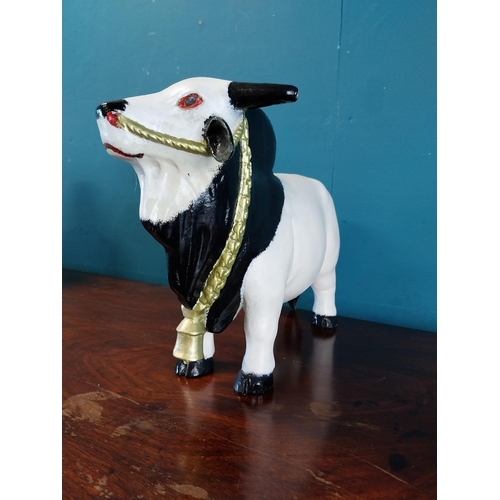 913 - Resin model of a Bull {25 cm H x 33 cm W x 17 cm D}.