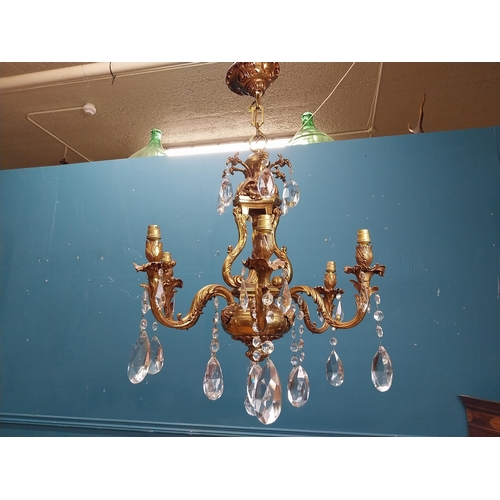 915 - 19th C. gilded brass four branch chandelier. {97 cm H x 65 cm Dia.}.