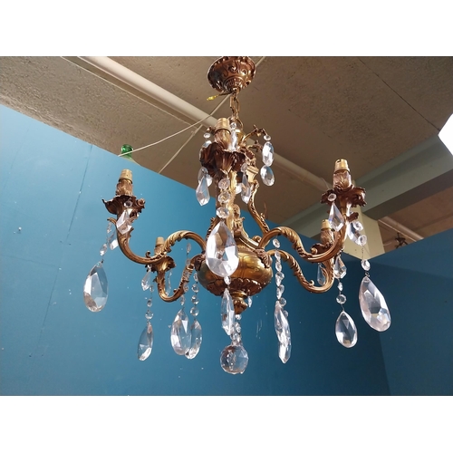 915 - 19th C. gilded brass four branch chandelier. {97 cm H x 65 cm Dia.}.