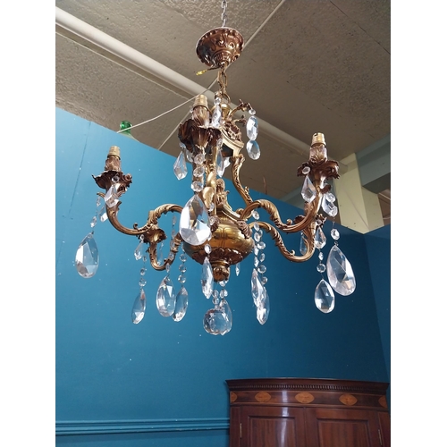 915 - 19th C. gilded brass four branch chandelier. {97 cm H x 65 cm Dia.}.