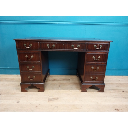 923 - Mahogany pedestal desk with tooled leather top and eight short drawers and single drawer in frieze r... 