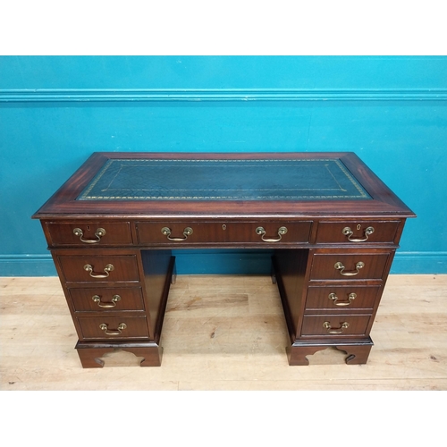 923 - Mahogany pedestal desk with tooled leather top and eight short drawers and single drawer in frieze r... 