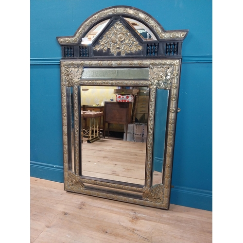 931 - 19th C. French brass and ebonised cushion mirror with floral decoration. {131 cm H x 86 cm W}.