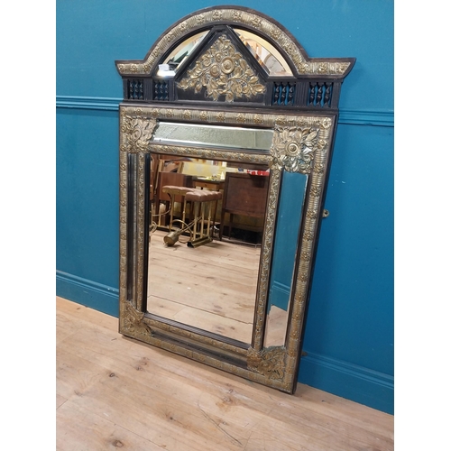 931 - 19th C. French brass and ebonised cushion mirror with floral decoration. {131 cm H x 86 cm W}.