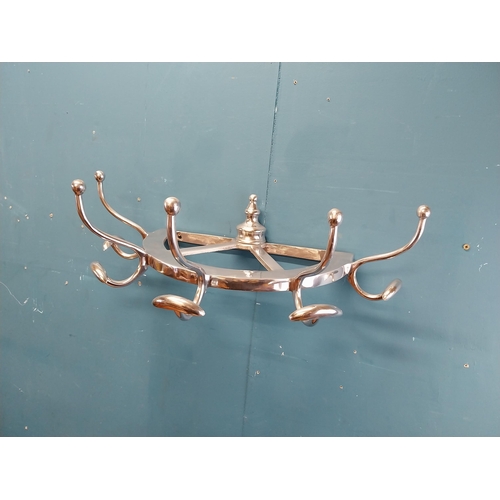 932 - Chrome coat rack {19 cm H x 65 cm W x 34 cm D}.