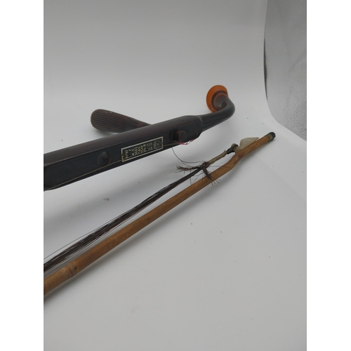 935 - Xinghai Chinese violin and bow. {82 cm L x 13 cm W x 10 cm D}.