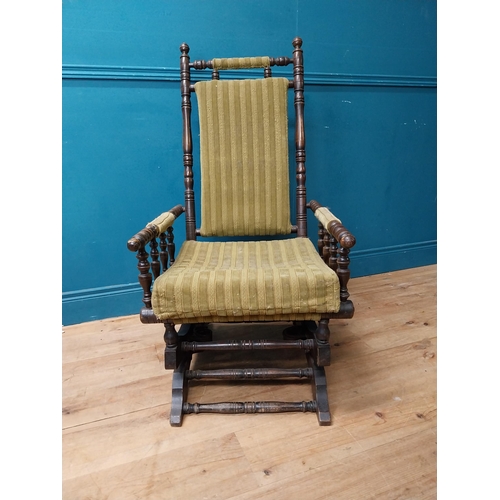 937 - Edwardian mahogany and upholstered rocking chair {112 cm H x 58 cm W x 68 cm D}.