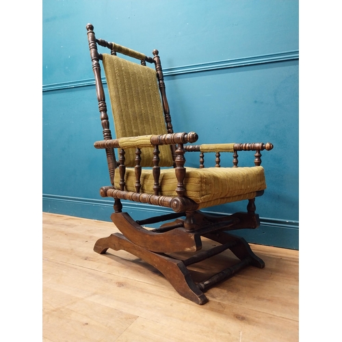 937 - Edwardian mahogany and upholstered rocking chair {112 cm H x 58 cm W x 68 cm D}.