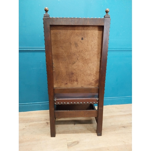 947 - Edwardian carved oak and leather upholstered throne chair. {165 cm H x 63 cm W x 55 cm D}.