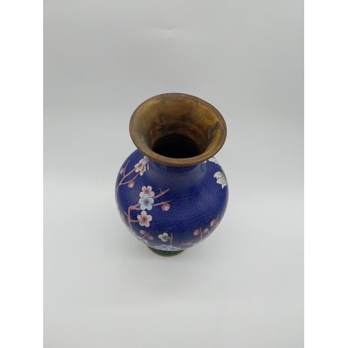 950 - Oriental cloisonne vase depicting flowers. {30 cm H x 17 cm Dia.}.