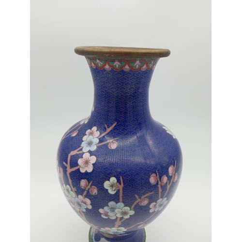 950 - Oriental cloisonne vase depicting flowers. {30 cm H x 17 cm Dia.}.