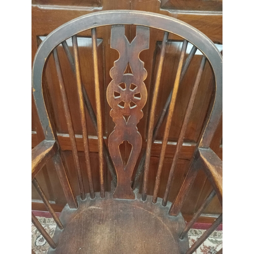 953 - Oak Windsor spindle armchair{H 100cm x W 53cm x D 50cm }. { not on site for viewing }.